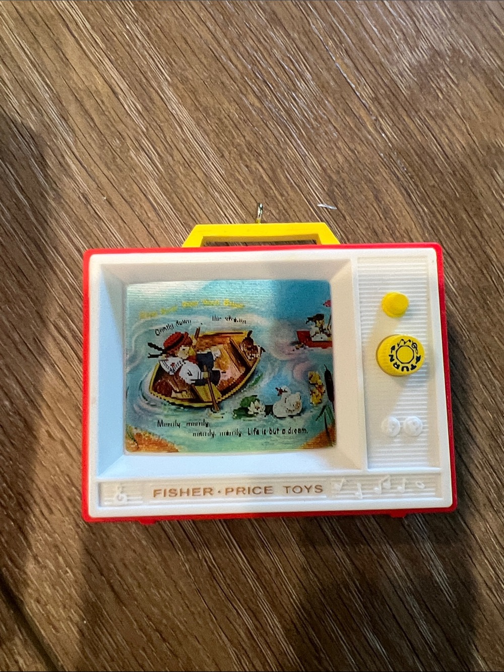 Hallmark Fisher-Price Two Tune TV Ornament in Red, White, Yellow - Picture 5 of 6